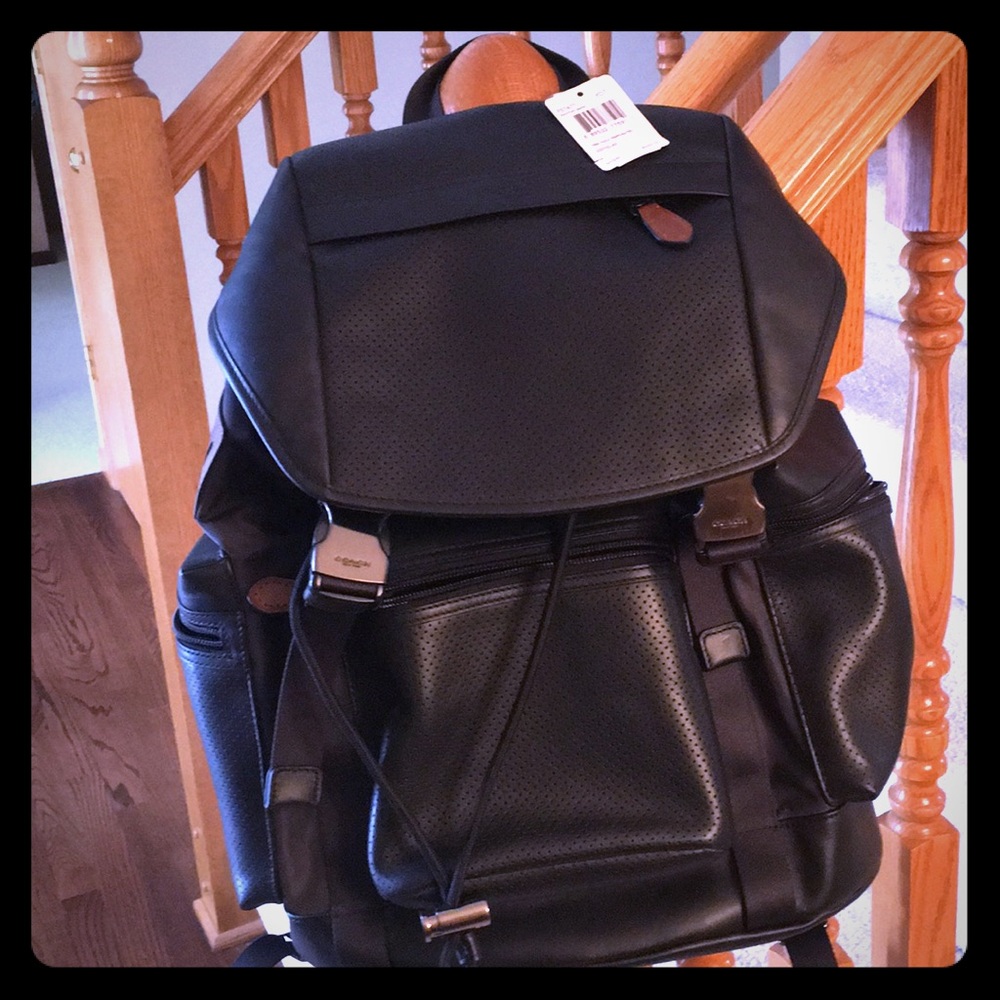 Coach Black perforated leather backpack. NWT